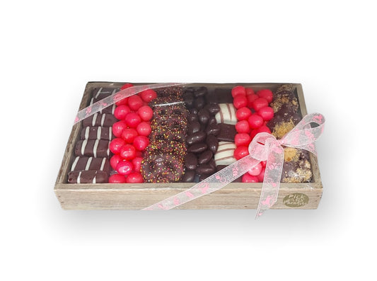 Personalised presentation tray containing pick 'n' mix and chocolate goodies.