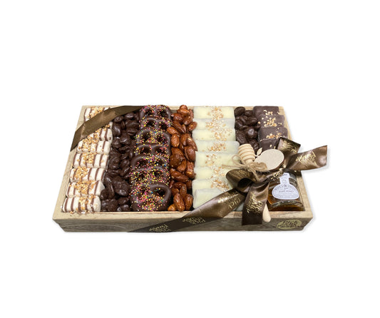 Personalised tray containing pick 'n' mix and chocolate goodies.